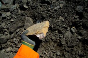 Geologist Finds Sulfide Nickel Ore Rock