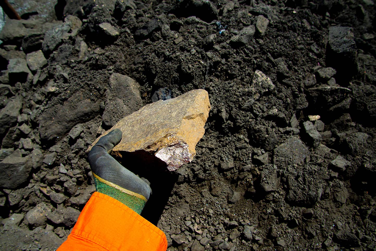 Geologist Finds Sulfide Nickel Ore Rock